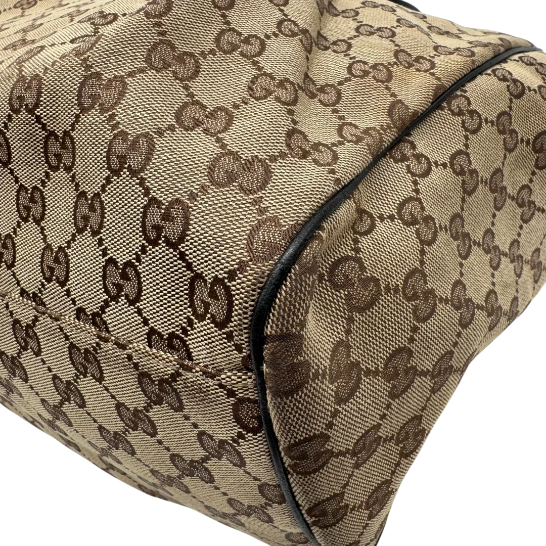 https://cdn.shopify.com/s/files/1/0564/9376/8855/files/Gucci_Shopper_Sukey_large_monogram_beige_7.webp?v=1781106235