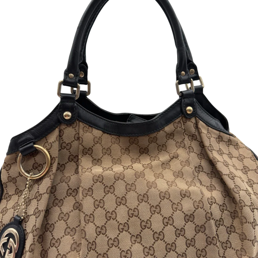 https://cdn.shopify.com/s/files/1/0564/9376/8855/files/Gucci_Shopper_Sukey_large_monogram_beige_8_74875063-0609-45dc-87bf-a8a207106410.webp?v=1784240823