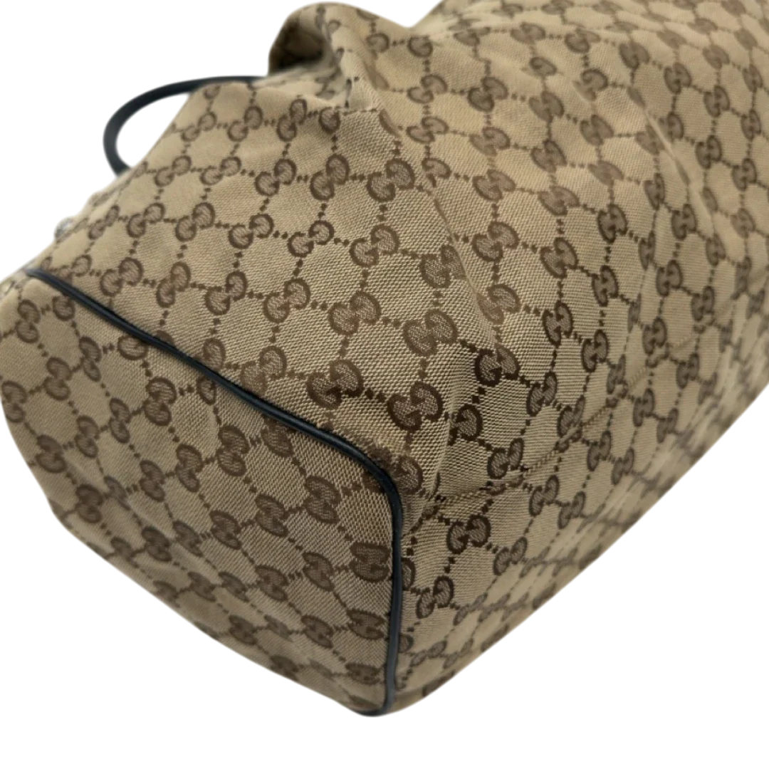 https://cdn.shopify.com/s/files/1/0564/9376/8855/files/Gucci_Shopper_Sukey_large_monogram_beige_8_a5b56a23-b14c-4c36-a198-1816ded72cbd.webp?v=1783515047