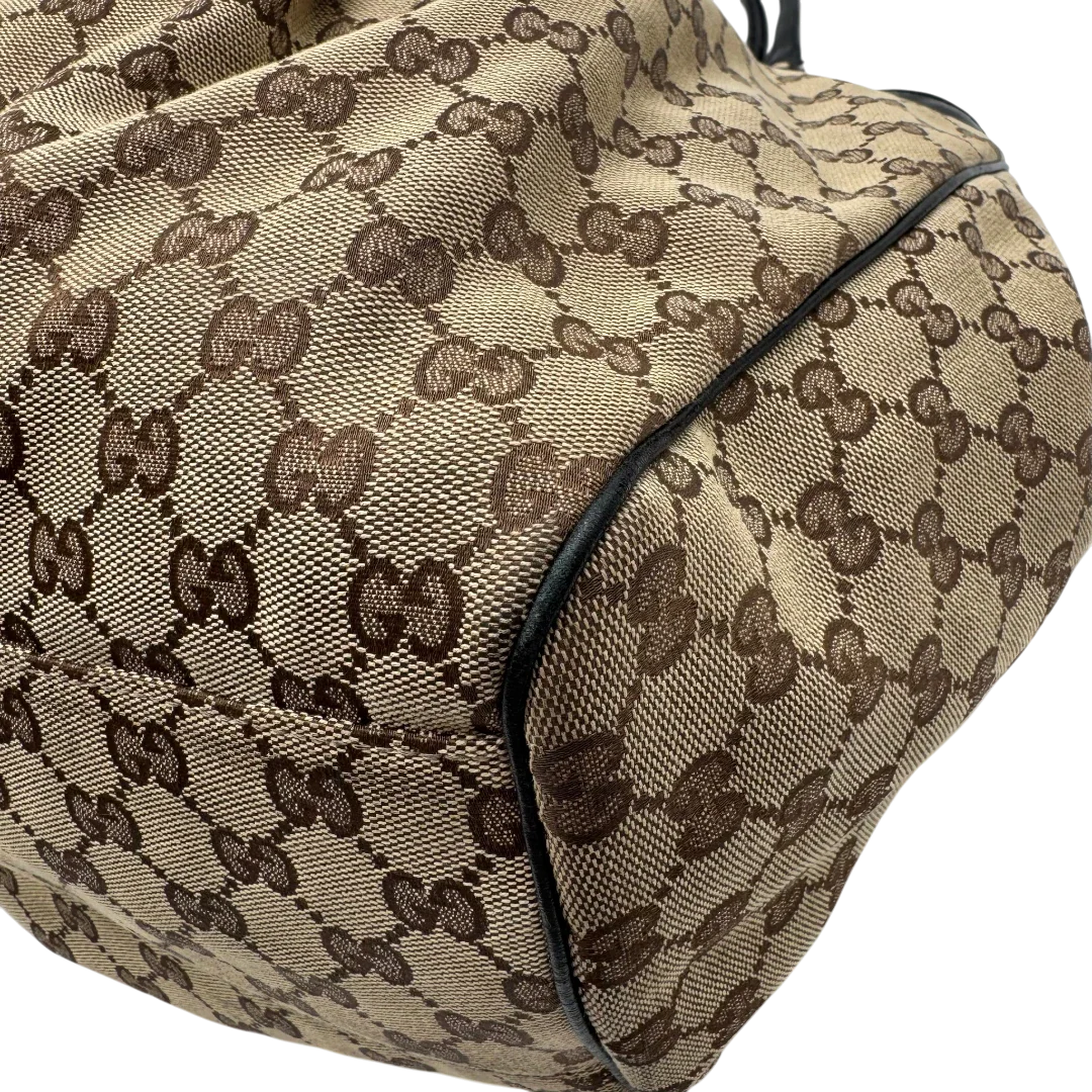 https://cdn.shopify.com/s/files/1/0564/9376/8855/files/Gucci_Shopper_Sukey_large_monogram_beige_9.webp?v=1781106235
