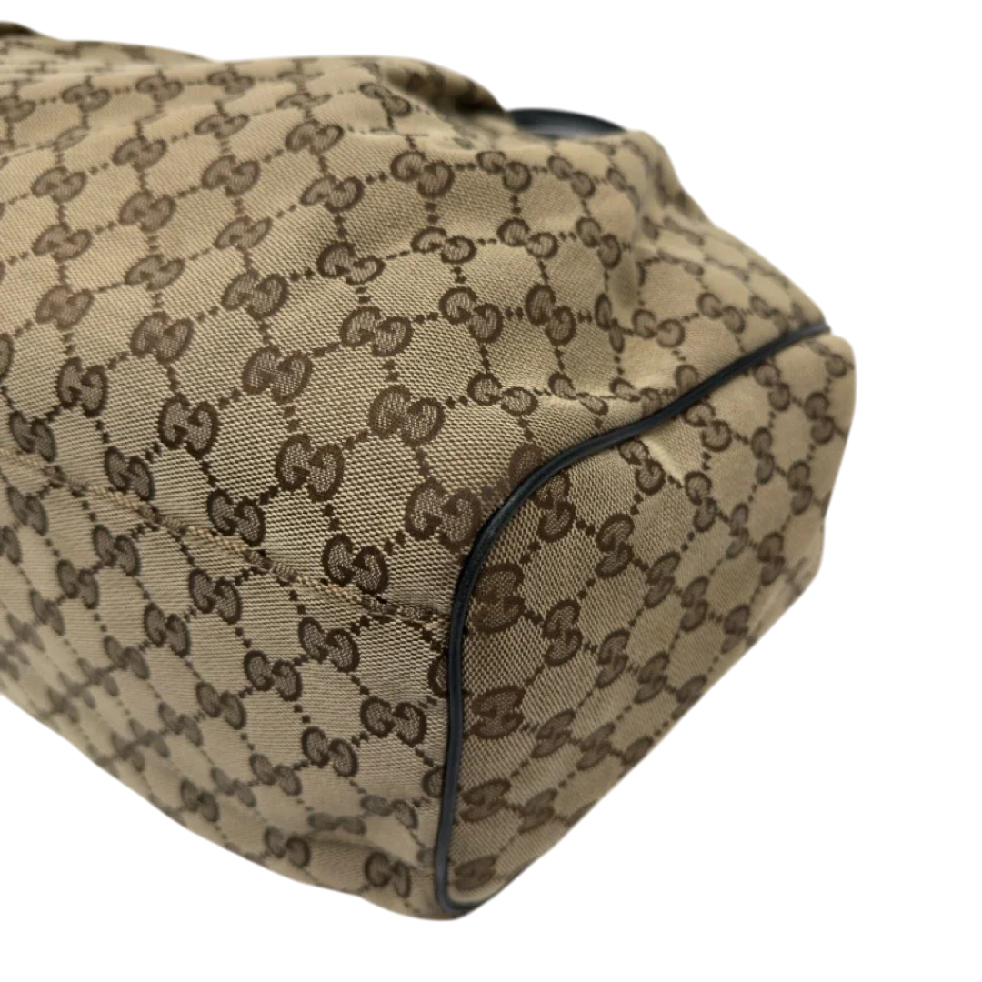 https://cdn.shopify.com/s/files/1/0564/9376/8855/files/Gucci_Shopper_Sukey_large_monogram_beige_9_3bdd2dd5-c77b-4ae3-8e84-9dfadb54dc91.webp?v=1783515047