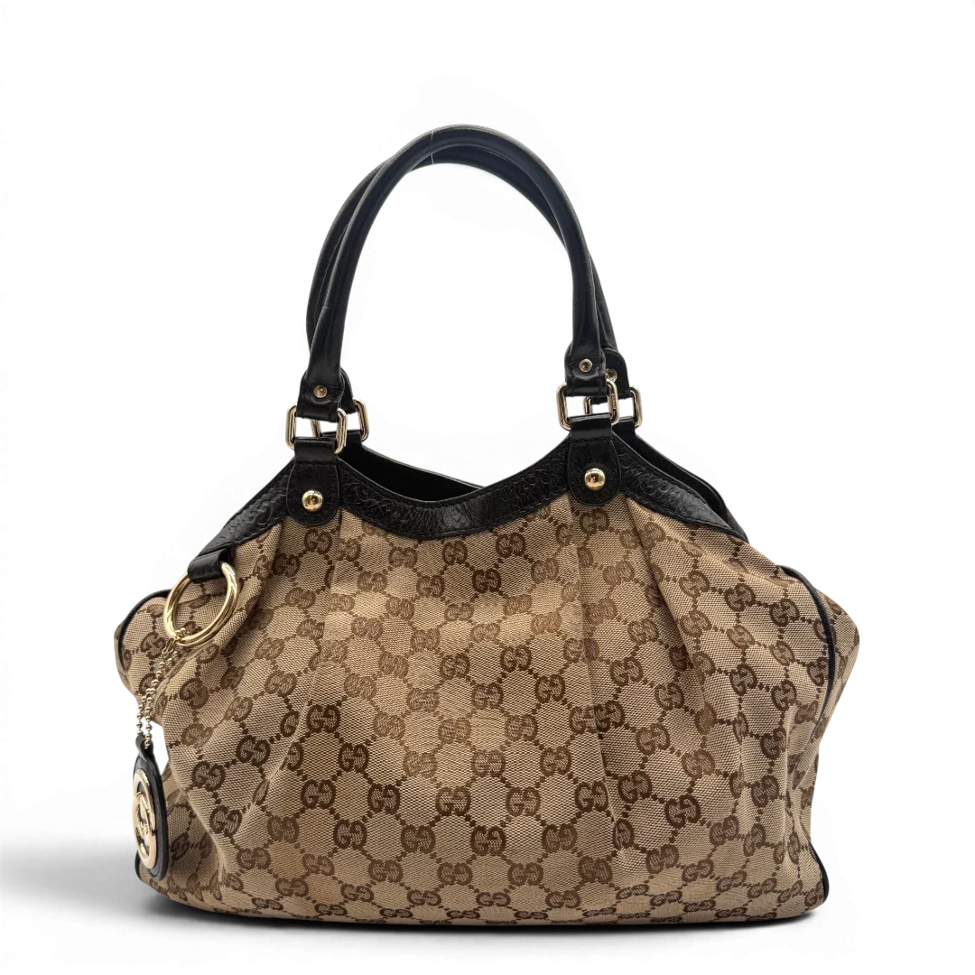 https://cdn.shopify.com/s/files/1/0564/9376/8855/files/Gucci_Shopper_Sukey_monogram_beige_1.webp?v=1782310481