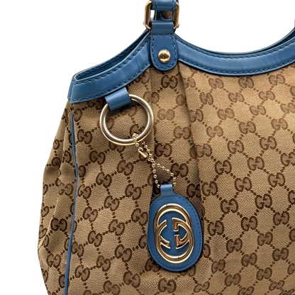 https://cdn.shopify.com/s/files/1/0564/9376/8855/files/Gucci_Shopper_Sukey_monogram_beige_11_418223f7-4bd2-45ad-a99b-c5e853af0a1a.webp?v=1784801539