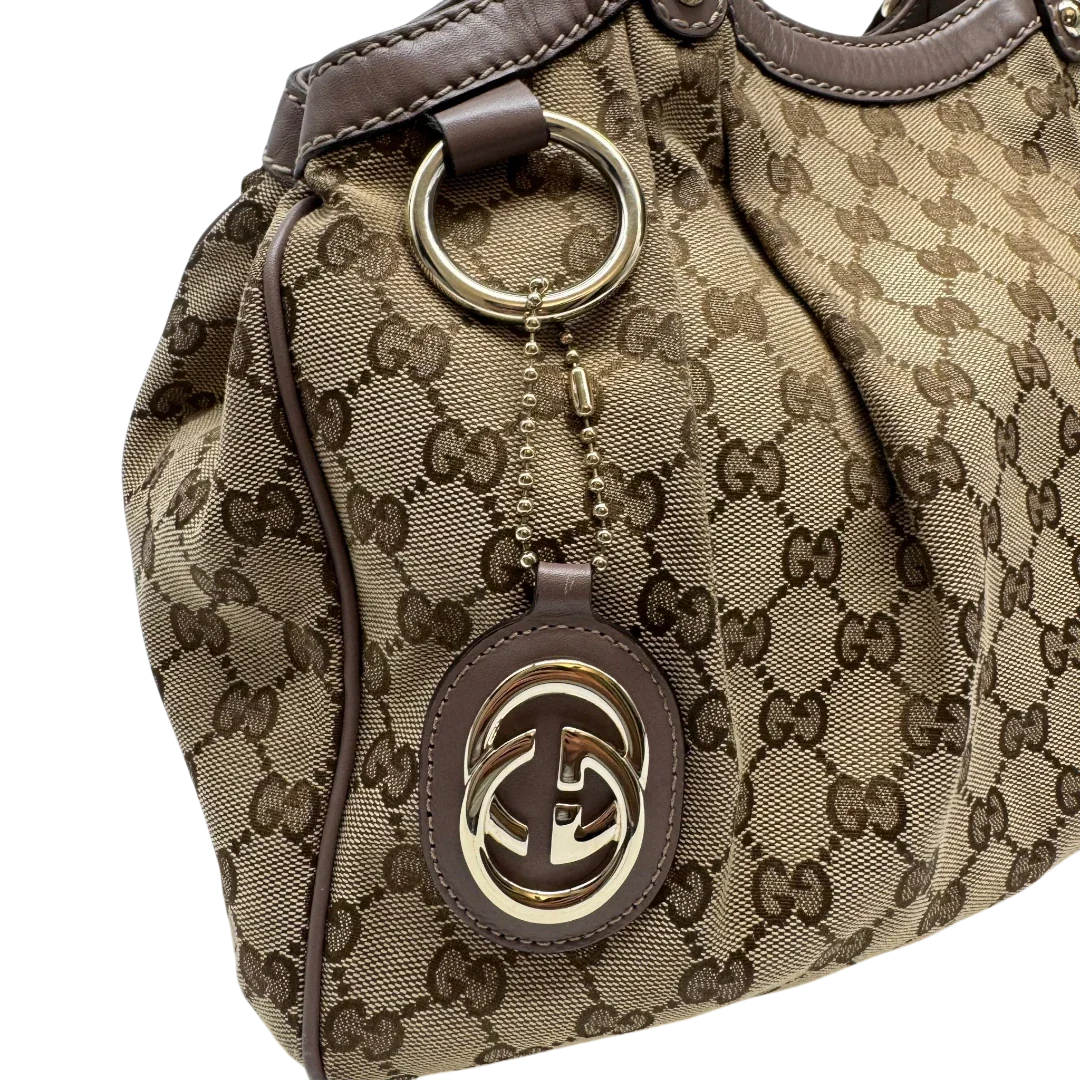 https://cdn.shopify.com/s/files/1/0564/9376/8855/files/Gucci_Shopper_Sukey_monogram_beige_11_5883ca66-3d2e-435d-98f2-d15092a4802c.webp?v=1784242767