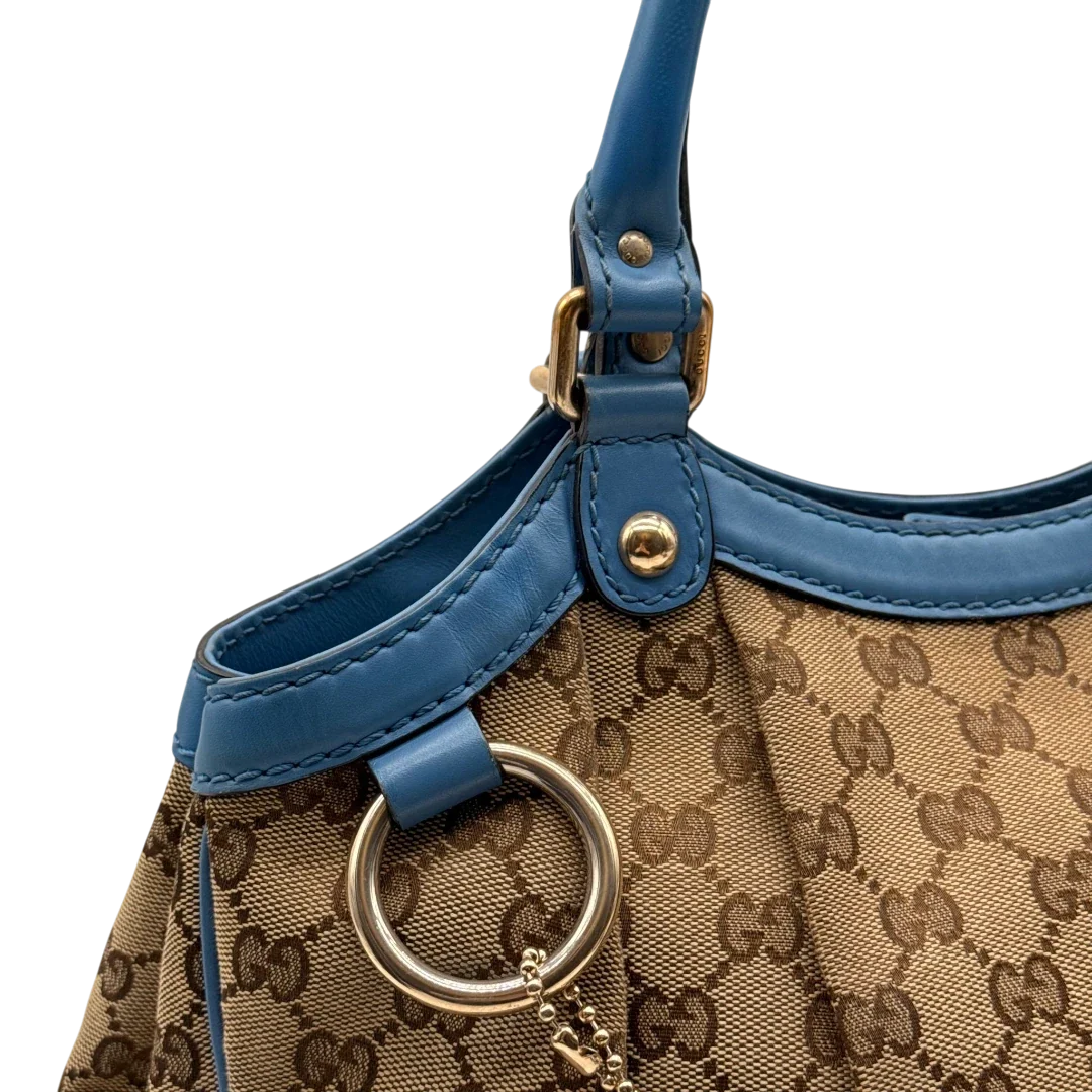 https://cdn.shopify.com/s/files/1/0564/9376/8855/files/Gucci_Shopper_Sukey_monogram_beige_13_ea7be457-674b-42f5-ad9a-3069a59fdcb4.webp?v=1784801539