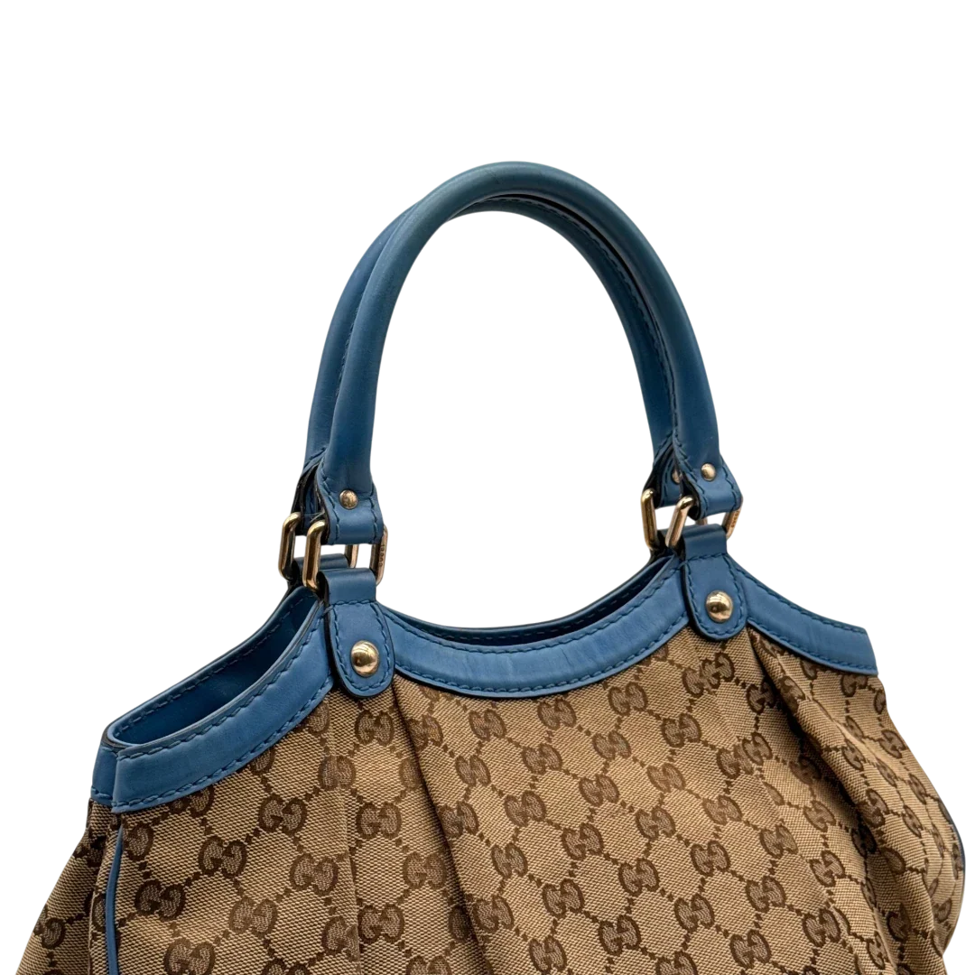 https://cdn.shopify.com/s/files/1/0564/9376/8855/files/Gucci_Shopper_Sukey_monogram_beige_14_f53e8ed0-6062-40a8-aa0f-ea8c61975c7b.webp?v=1784801539