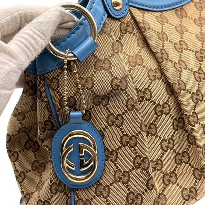 https://cdn.shopify.com/s/files/1/0564/9376/8855/files/Gucci_Shopper_Sukey_monogram_beige_15_e746583f-8c48-4d5c-a8fb-ea91b2285041.webp?v=1784801539