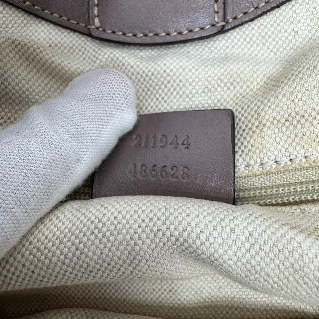 https://cdn.shopify.com/s/files/1/0564/9376/8855/files/Gucci_Shopper_Sukey_monogram_beige_19.webp?v=1784242767
