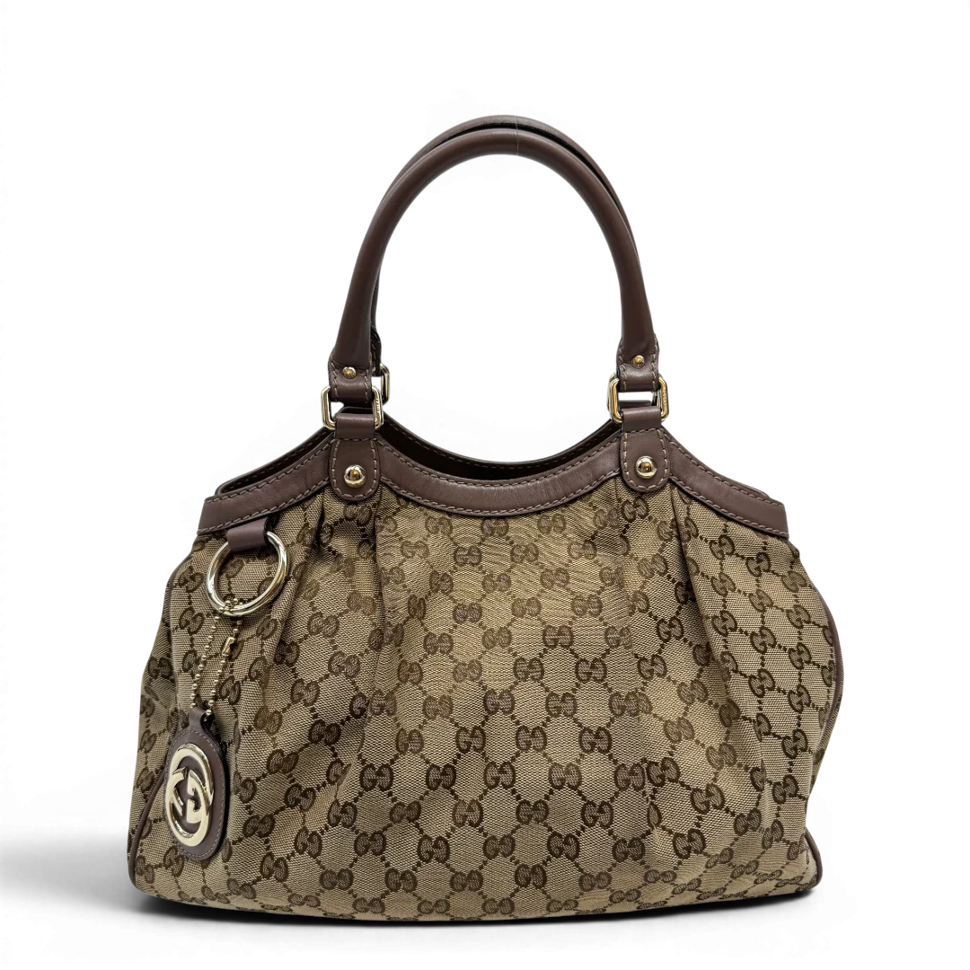 https://cdn.shopify.com/s/files/1/0564/9376/8855/files/Gucci_Shopper_Sukey_monogram_beige_1_64747a8d-a4df-4b40-9846-0761258e795a.webp?v=1784242766