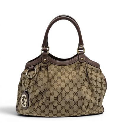 https://cdn.shopify.com/s/files/1/0564/9376/8855/files/Gucci_Shopper_Sukey_monogram_beige_1_64747a8d-a4df-4b40-9846-0761258e795a.webp?v=1784242766