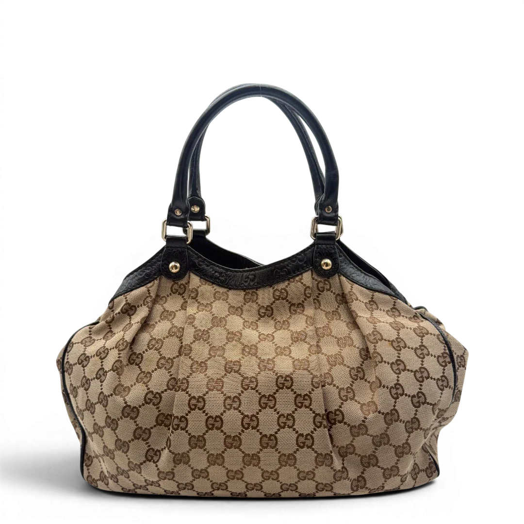 https://cdn.shopify.com/s/files/1/0564/9376/8855/files/Gucci_Shopper_Sukey_monogram_beige_2.webp?v=1782310481