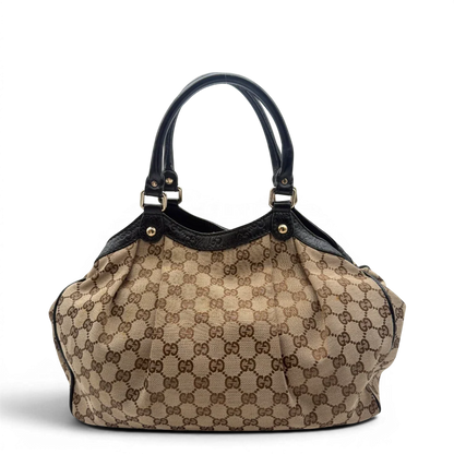 https://cdn.shopify.com/s/files/1/0564/9376/8855/files/Gucci_Shopper_Sukey_monogram_beige_2.webp?v=1782310481