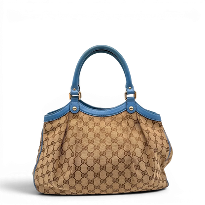https://cdn.shopify.com/s/files/1/0564/9376/8855/files/Gucci_Shopper_Sukey_monogram_beige_2_268e4af4-64a9-426d-949d-46c5174f905c.webp?v=1784801538