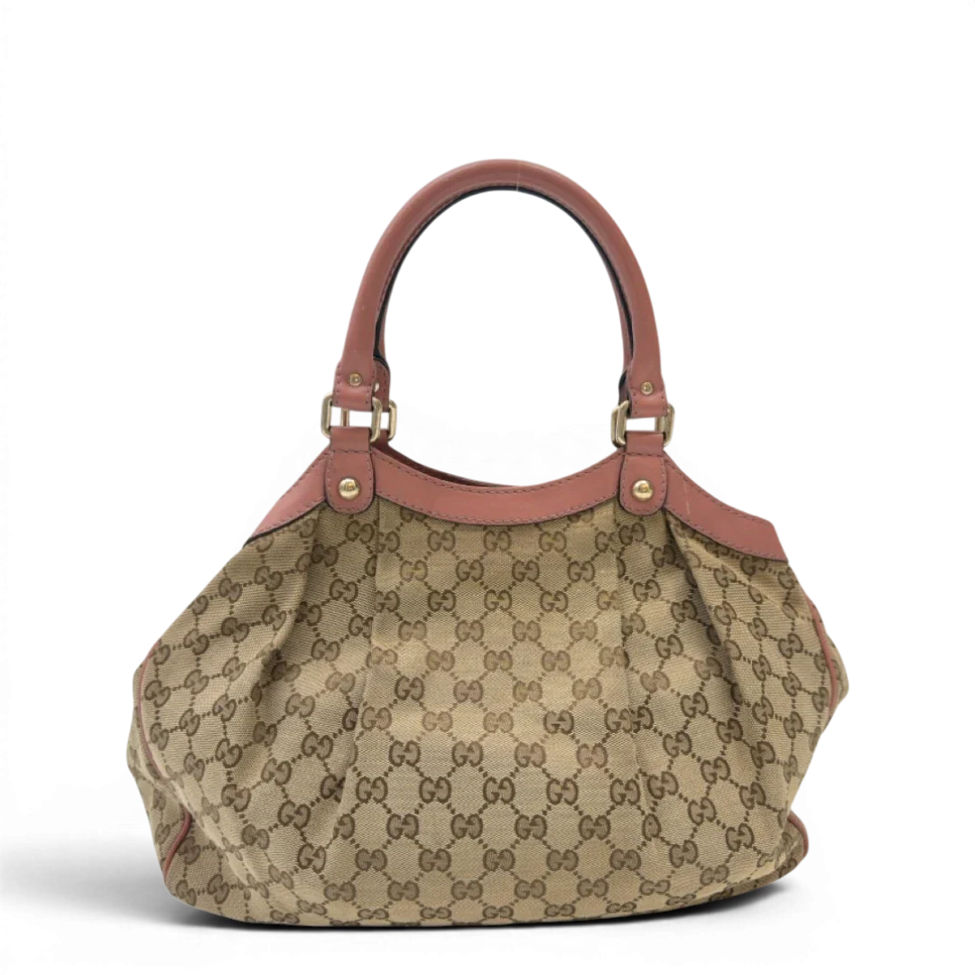https://cdn.shopify.com/s/files/1/0564/9376/8855/files/Gucci_Shopper_Sukey_monogram_beige_2_fb1bb8db-7ee9-4b61-97b6-e0405cf4c905.webp?v=1783515169