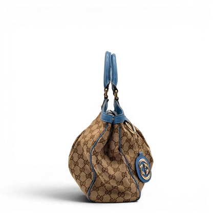 https://cdn.shopify.com/s/files/1/0564/9376/8855/files/Gucci_Shopper_Sukey_monogram_beige_3_40d7f487-5121-40cc-8057-90da313946bd.webp?v=1784801538