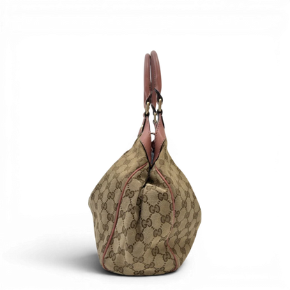 https://cdn.shopify.com/s/files/1/0564/9376/8855/files/Gucci_Shopper_Sukey_monogram_beige_4_c492baaa-9bb2-465e-8818-3876256223ed.webp?v=1783515169