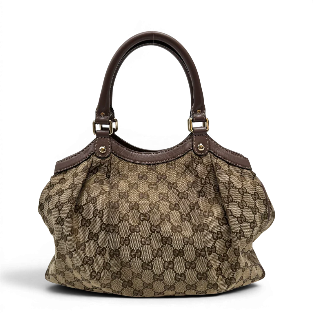 https://cdn.shopify.com/s/files/1/0564/9376/8855/files/Gucci_Shopper_Sukey_monogram_beige_4_d4784a0f-b516-440c-a0c9-1c1d14896f90.webp?v=1784242766