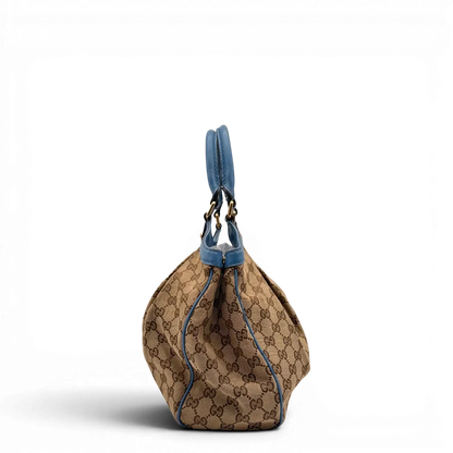 https://cdn.shopify.com/s/files/1/0564/9376/8855/files/Gucci_Shopper_Sukey_monogram_beige_4_f5de0998-fc56-4088-befb-355a63baa116.webp?v=1784801538