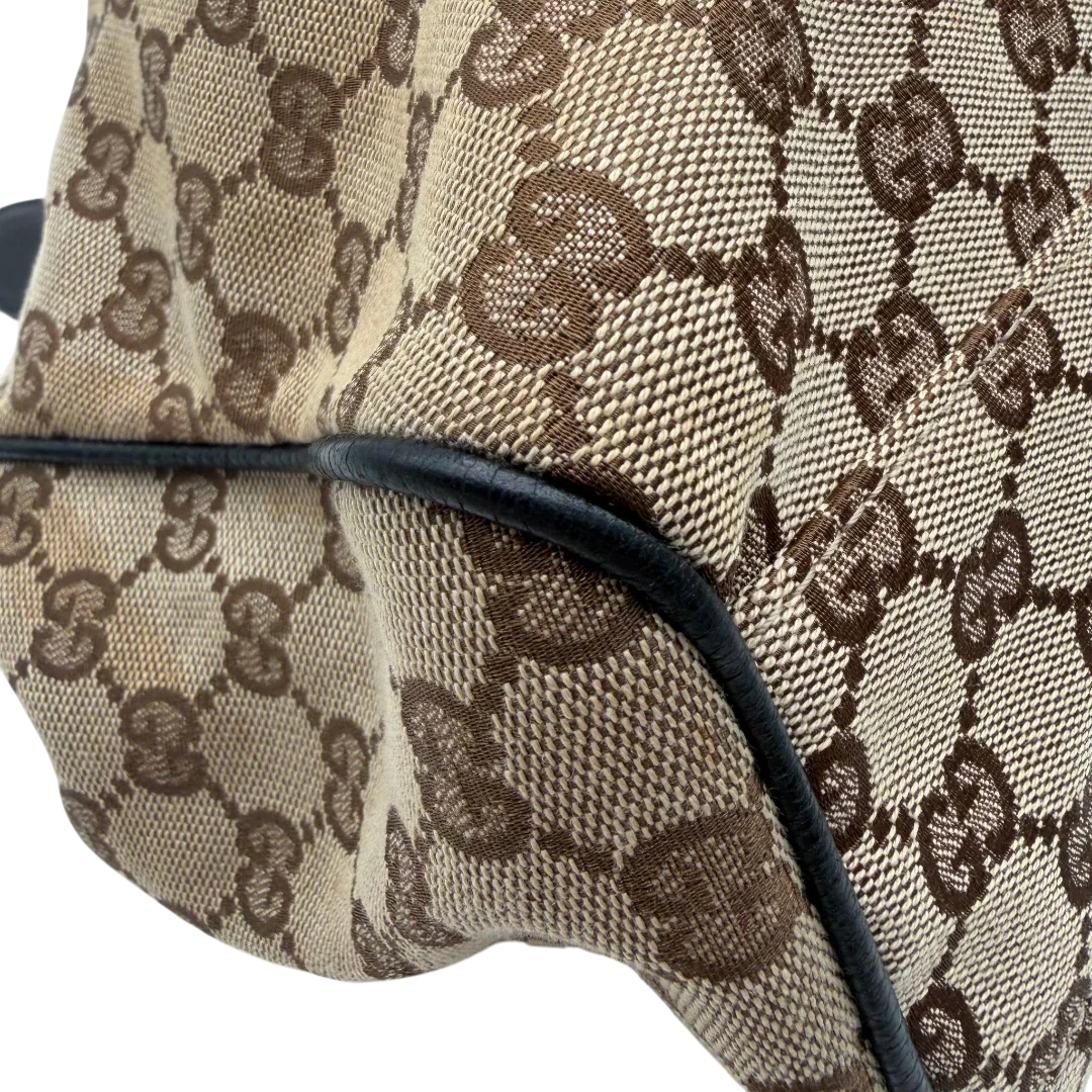 https://cdn.shopify.com/s/files/1/0564/9376/8855/files/Gucci_Shopper_Sukey_monogram_beige_7.webp?v=1782310481
