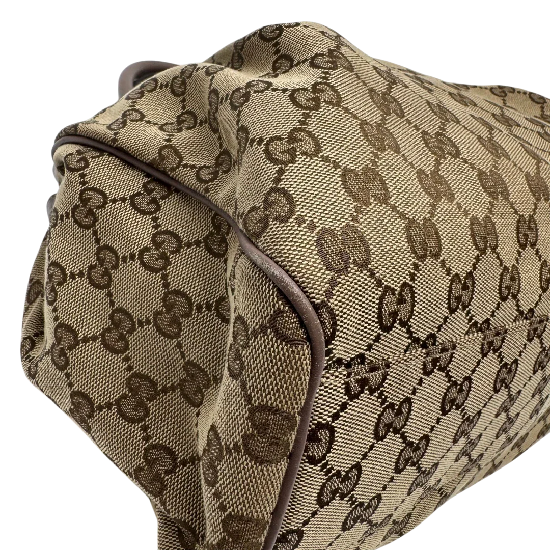 https://cdn.shopify.com/s/files/1/0564/9376/8855/files/Gucci_Shopper_Sukey_monogram_beige_8_0c788864-86cb-4495-a91b-cc3f7097d8a7.webp?v=1784242767