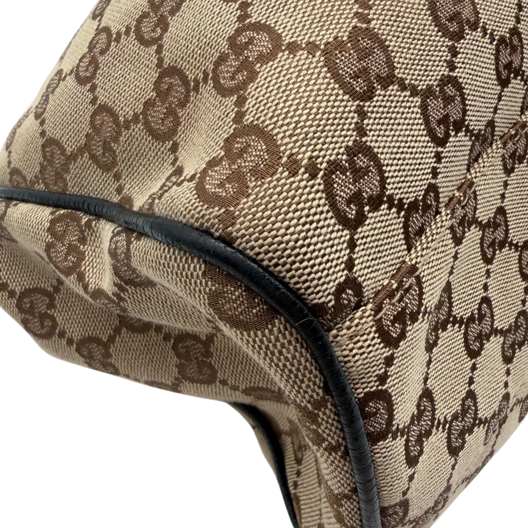 https://cdn.shopify.com/s/files/1/0564/9376/8855/files/Gucci_Shopper_Sukey_monogram_beige_9.webp?v=1782310481