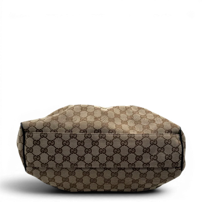 https://cdn.shopify.com/s/files/1/0564/9376/8855/files/Gucci_Shopper_Sukey_monogram_beige_vintage_GG1692.webp?v=1779407955