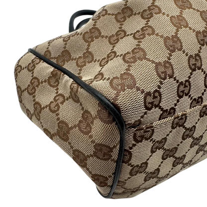 https://cdn.shopify.com/s/files/1/0564/9376/8855/files/Gucci_Shopper_Sukey_monogram_beige_vintage_GG1693.webp?v=1779407956