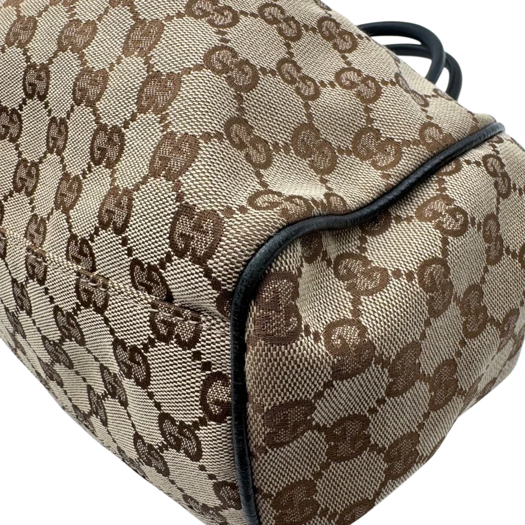 https://cdn.shopify.com/s/files/1/0564/9376/8855/files/Gucci_Shopper_Sukey_monogram_beige_vintage_GG1694.webp?v=1779407956