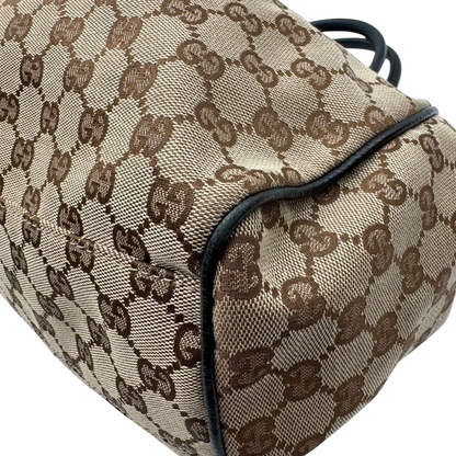 https://cdn.shopify.com/s/files/1/0564/9376/8855/files/Gucci_Shopper_Sukey_monogram_beige_vintage_GG1694.webp?v=1779407956