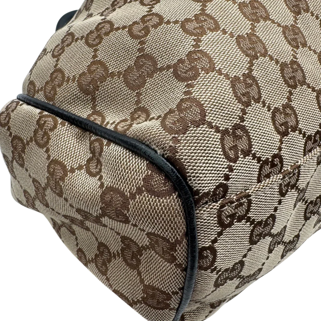 https://cdn.shopify.com/s/files/1/0564/9376/8855/files/Gucci_Shopper_Sukey_monogram_beige_vintage_GG1695.webp?v=1779407956