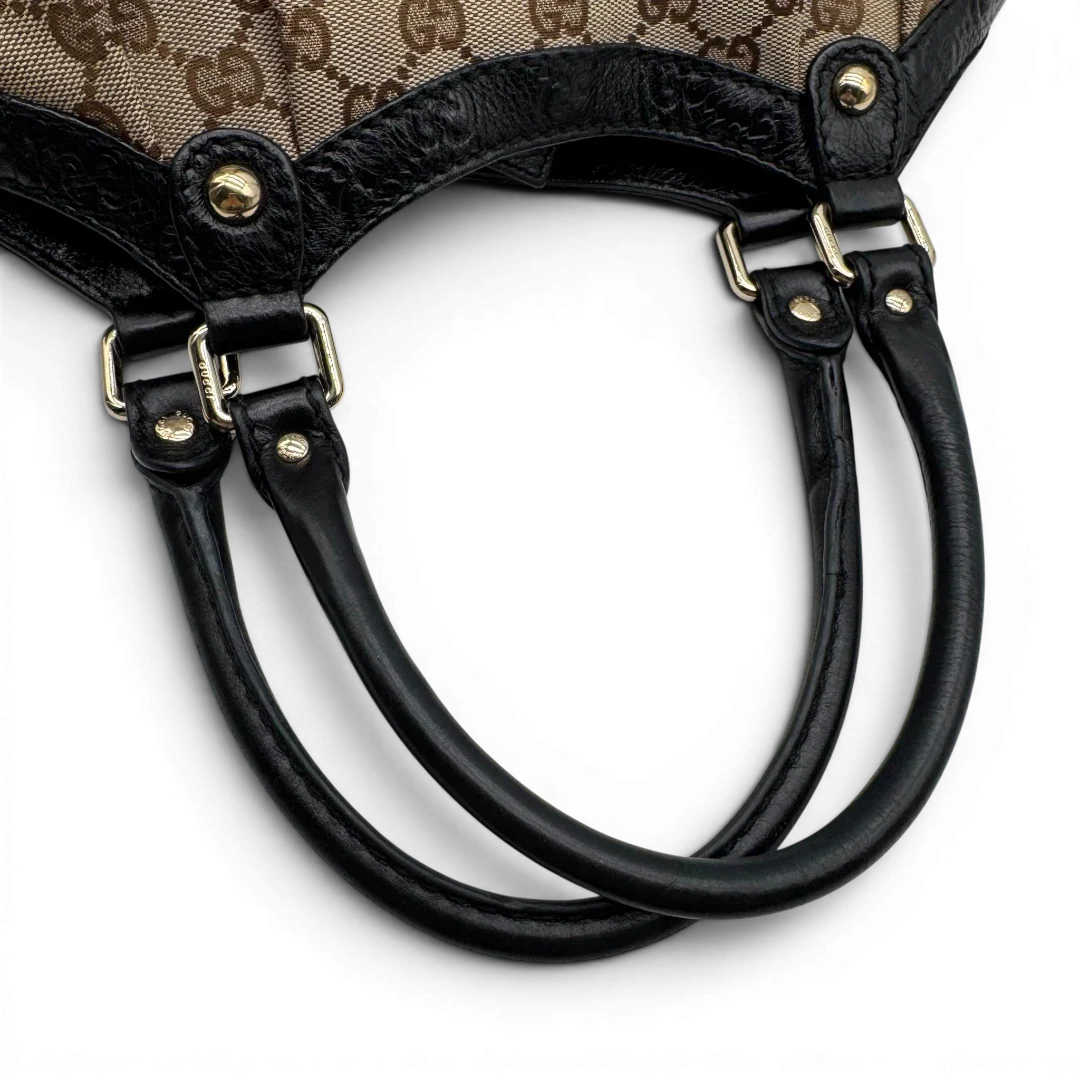 https://cdn.shopify.com/s/files/1/0564/9376/8855/files/Gucci_Shopper_Sukey_monogram_beige_vintage_GG1697.webp?v=1779407955