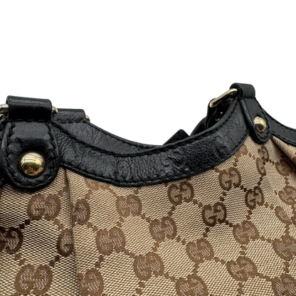 https://cdn.shopify.com/s/files/1/0564/9376/8855/files/Gucci_Shopper_Sukey_monogram_beige_vintage_GG1700.webp?v=1779407956