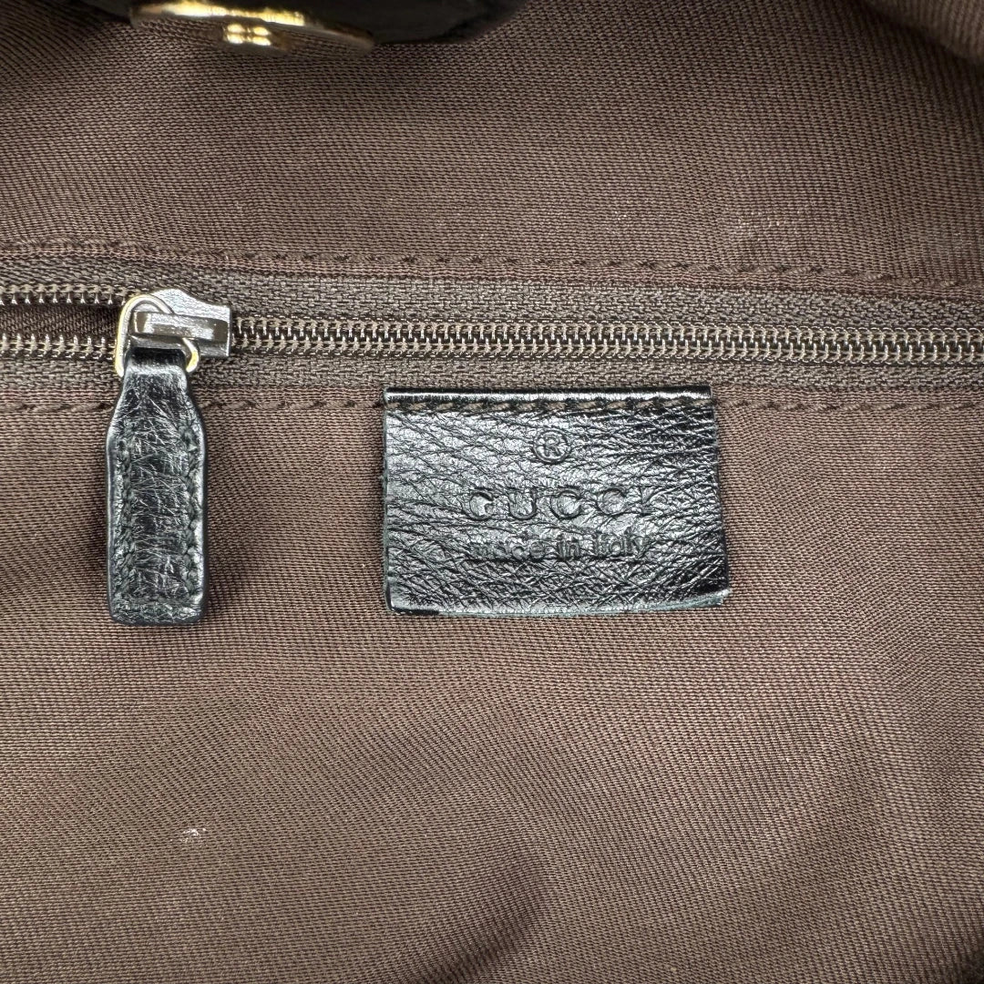 https://cdn.shopify.com/s/files/1/0564/9376/8855/files/Gucci_Shopper_Sukey_monogram_beige_vintage_GG1704.webp?v=1779407956