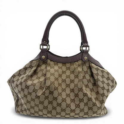 https://cdn.shopify.com/s/files/1/0564/9376/8855/files/Gucci_Shopper_Sukey_monogram_beige_vintage_GG6139.webp?v=1775065193