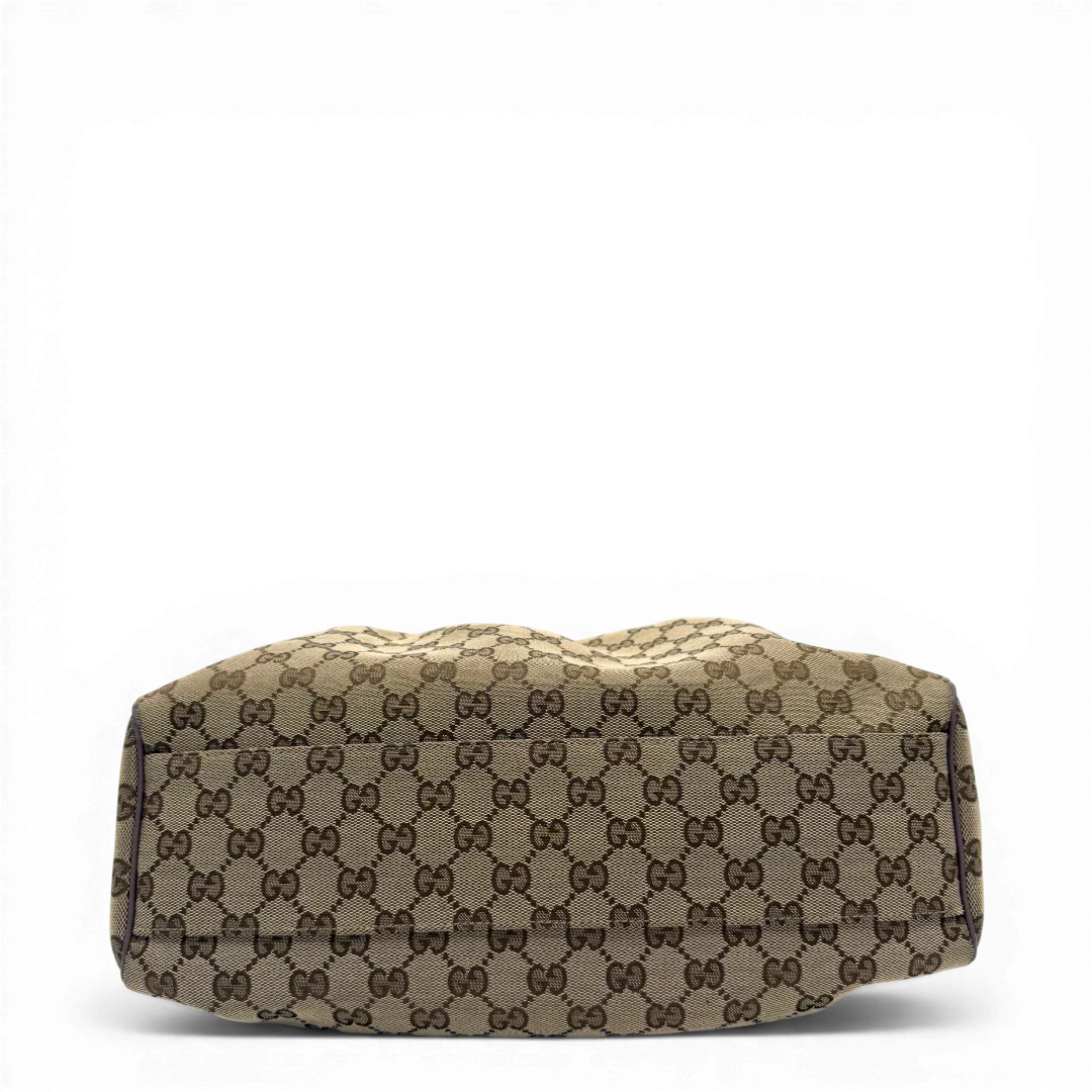 https://cdn.shopify.com/s/files/1/0564/9376/8855/files/Gucci_Shopper_Sukey_monogram_beige_vintage_GG6142.webp?v=1775065193