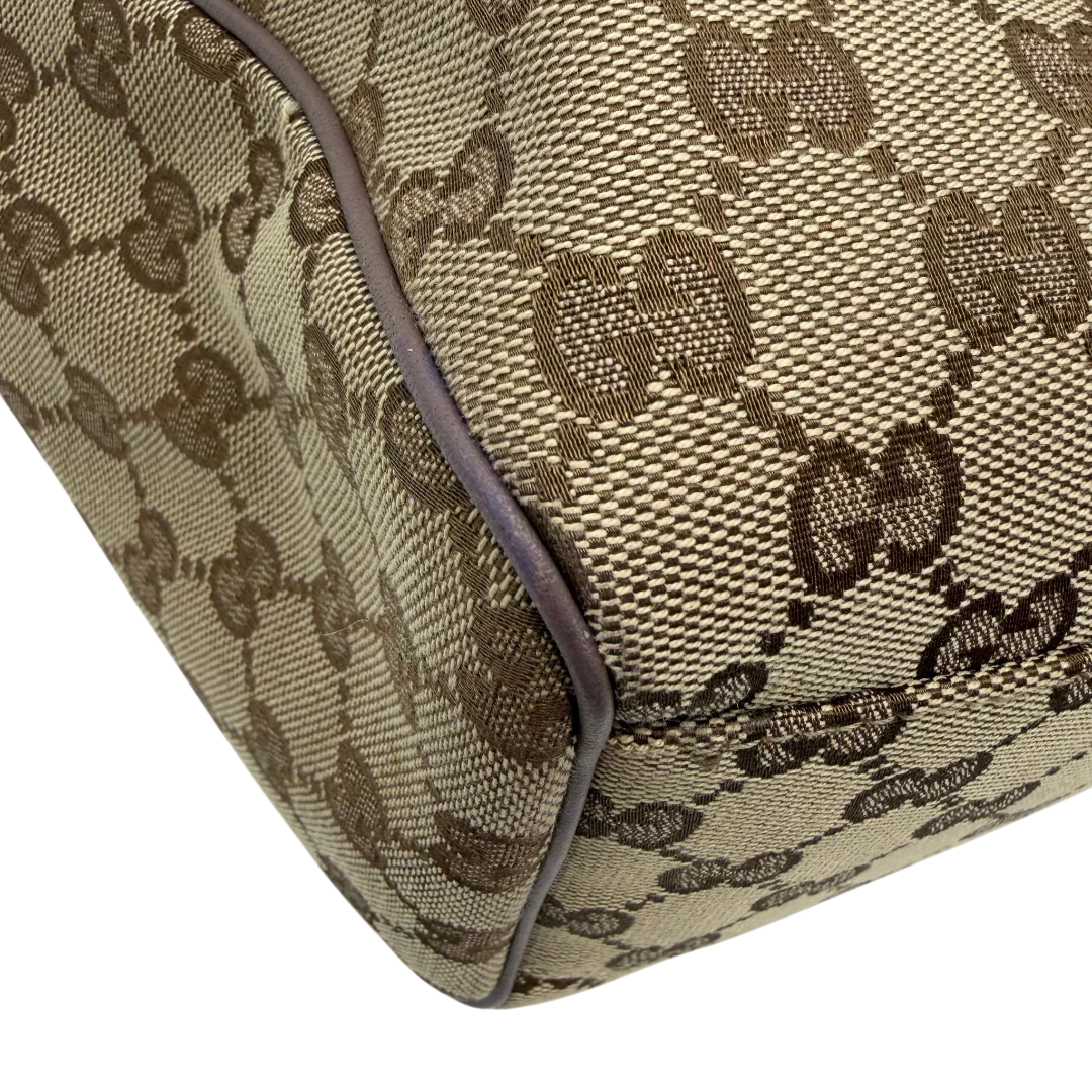 https://cdn.shopify.com/s/files/1/0564/9376/8855/files/Gucci_Shopper_Sukey_monogram_beige_vintage_GG6146.webp?v=1775065193