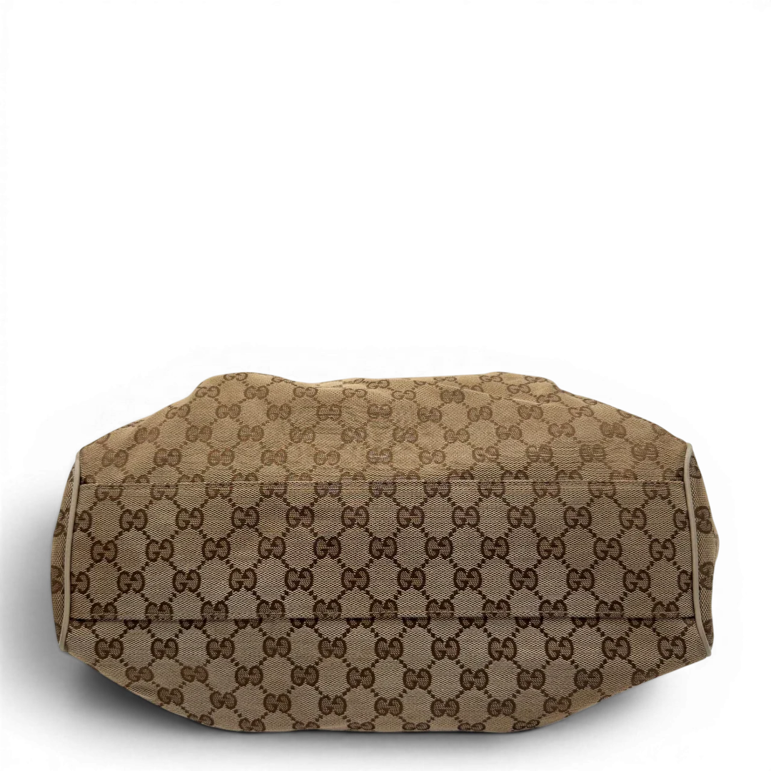https://cdn.shopify.com/s/files/1/0564/9376/8855/files/Gucci_Shopper_Sukey_monogram_beige_vintage_GG8436.webp?v=1781108879