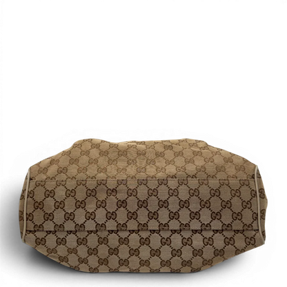 https://cdn.shopify.com/s/files/1/0564/9376/8855/files/Gucci_Shopper_Sukey_monogram_beige_vintage_GG8436.webp?v=1781108879