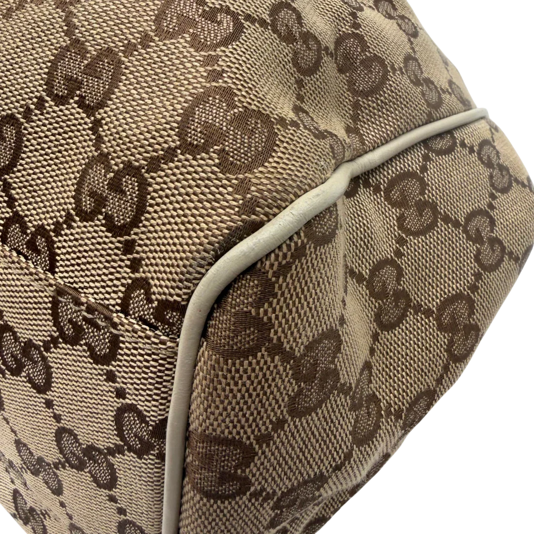 https://cdn.shopify.com/s/files/1/0564/9376/8855/files/Gucci_Shopper_Sukey_monogram_beige_vintage_GG8437.webp?v=1781108880