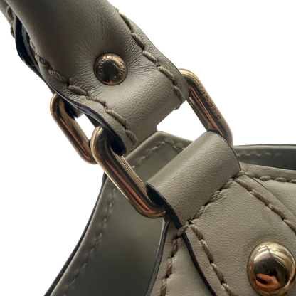 https://cdn.shopify.com/s/files/1/0564/9376/8855/files/Gucci_Shopper_Sukey_monogram_beige_vintage_GG8443.webp?v=1781108879