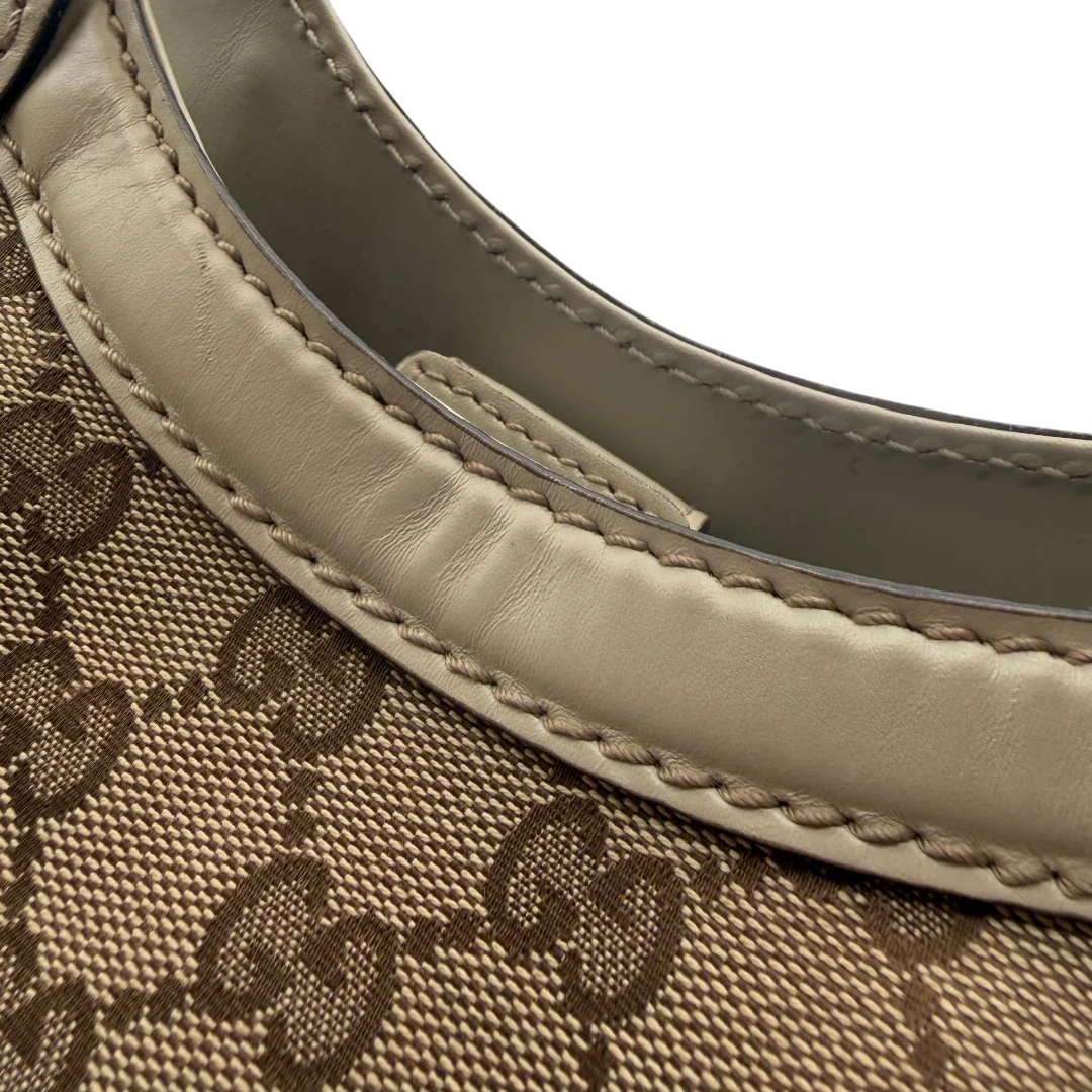 https://cdn.shopify.com/s/files/1/0564/9376/8855/files/Gucci_Shopper_Sukey_monogram_beige_vintage_GG8444.webp?v=1781108879