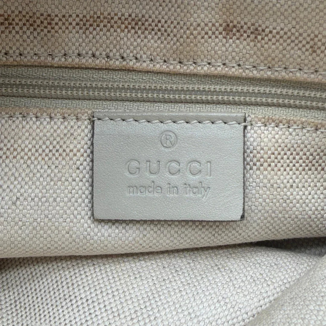 https://cdn.shopify.com/s/files/1/0564/9376/8855/files/Gucci_Shopper_Sukey_monogram_beige_vintage_GG8446.webp?v=1781108879