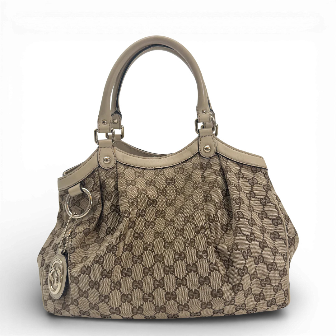 https://cdn.shopify.com/s/files/1/0564/9376/8855/files/Gucci_Shopper_Sukey_monogram_beige_vintage_GG_9855.webp?v=1770901506