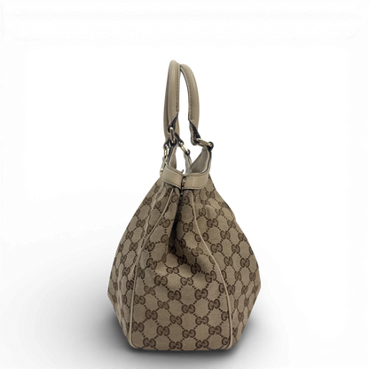 https://cdn.shopify.com/s/files/1/0564/9376/8855/files/Gucci_Shopper_Sukey_monogram_beige_vintage_GG_9857.webp?v=1770901535