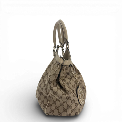 https://cdn.shopify.com/s/files/1/0564/9376/8855/files/Gucci_Shopper_Sukey_monogram_beige_vintage_GG_9858.webp?v=1770901535