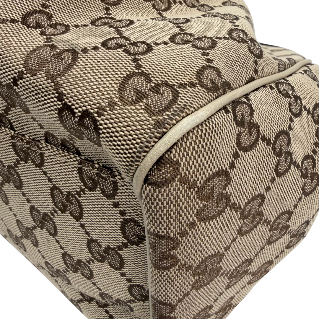 https://cdn.shopify.com/s/files/1/0564/9376/8855/files/Gucci_Shopper_Sukey_monogram_beige_vintage_GG_9860.webp?v=1770901535