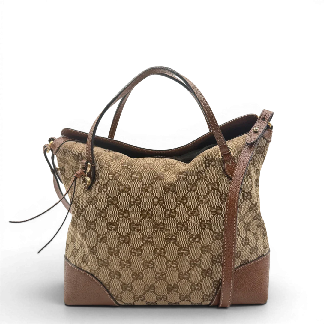 https://cdn.shopify.com/s/files/1/0564/9376/8855/files/Gucci_Shopper_monogram_beige_vintage_GG6156.webp?v=1778196776