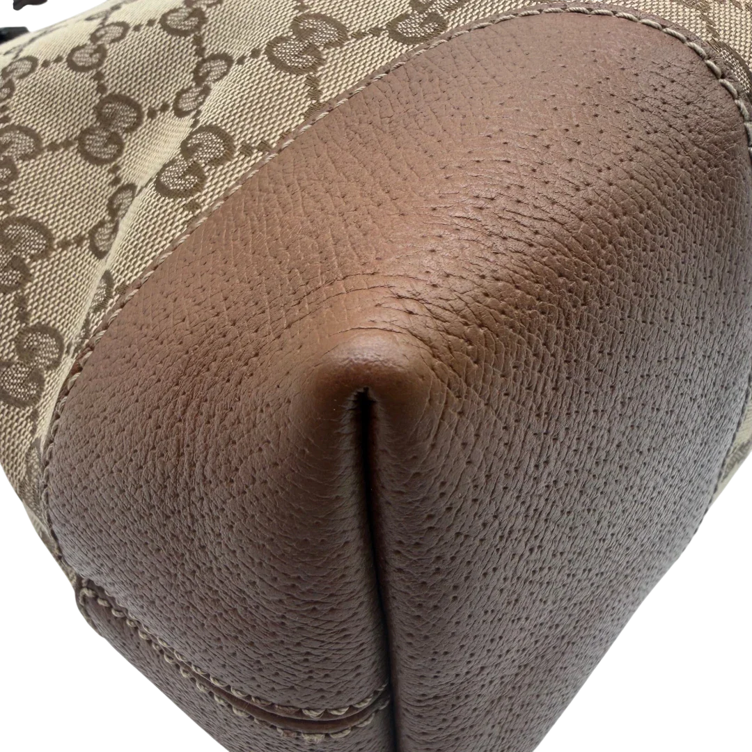 https://cdn.shopify.com/s/files/1/0564/9376/8855/files/Gucci_Shopper_monogram_beige_vintage_GG6165.webp?v=1778196776