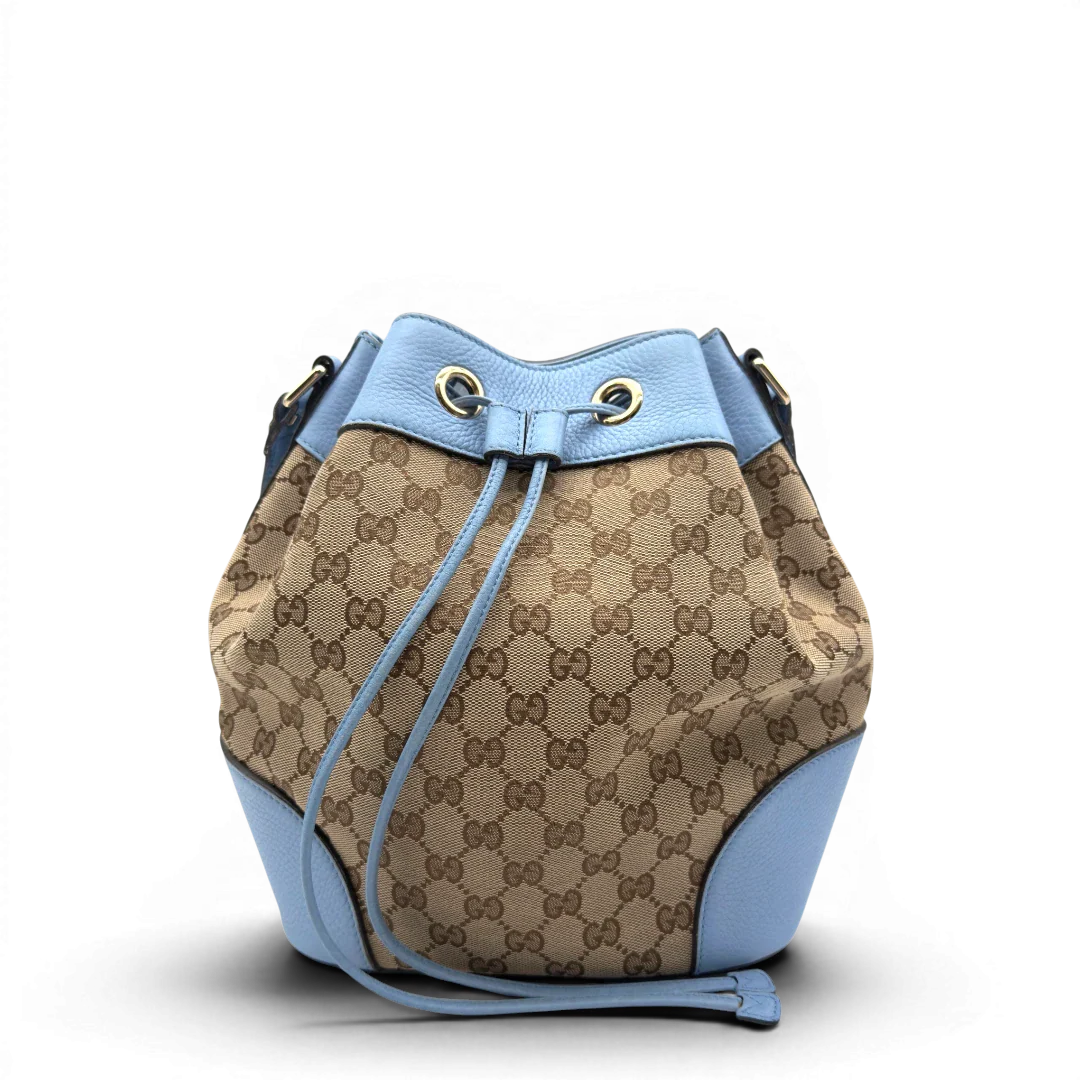 https://cdn.shopify.com/s/files/1/0564/9376/8855/files/Gucci_Umhangetasche_Bucket_monogram_beige_1.webp?v=1782385133