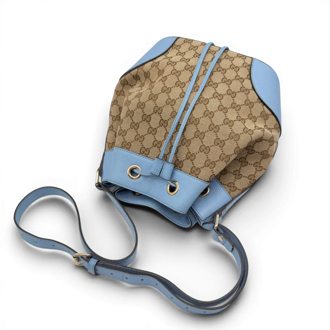 https://cdn.shopify.com/s/files/1/0564/9376/8855/files/Gucci_Umhangetasche_Bucket_monogram_beige_10.webp?v=1782385132